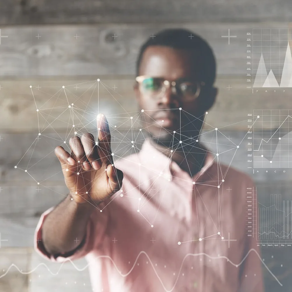 tech Young man touching in an invisible screen conveying technology concept