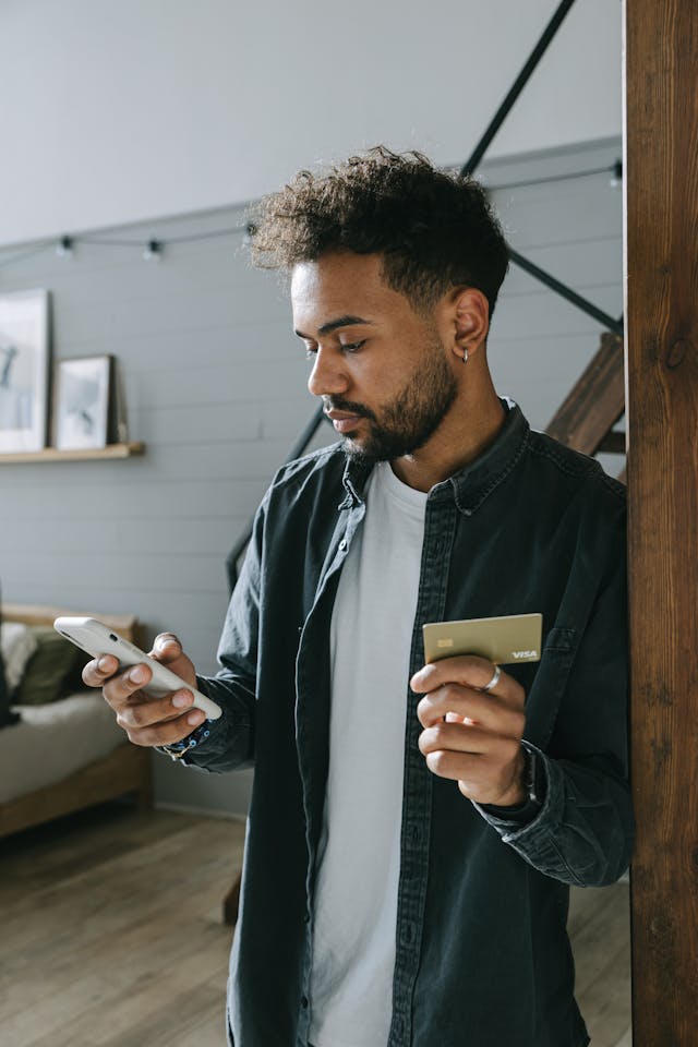 Tenant using their phone to make an online payment