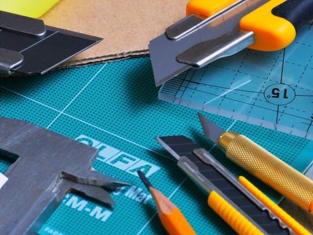 A bunch of tools and measuring tapes