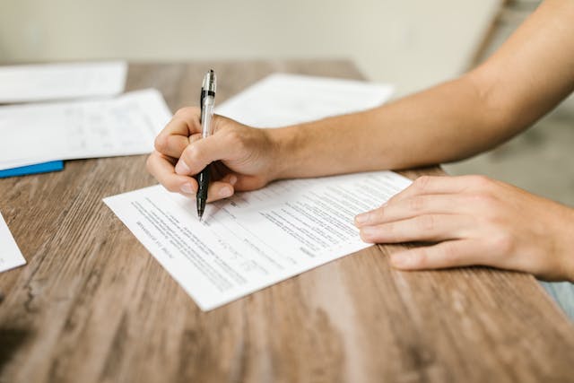 a person signing a document
