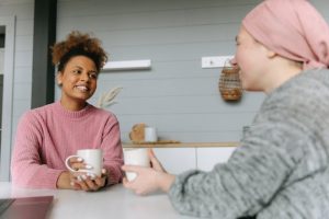 two-people-smiling-and-talking