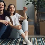 couple holding the keys to their apartment